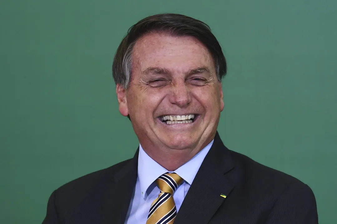 Bolsonaro compartilhou nesta quarta-feira, 18, nas redes sociais vídeo publicado pelo presidente russo | Foto: Evaristo SA | afp