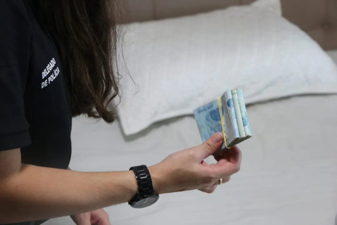 Suspeito com encontrado com mais de R$ 24 mil em espécie | Foto: Divulgação | SSP