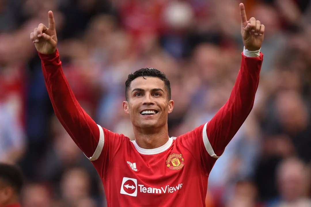 Diante dos torcedores dos Red Devils, Cristiano Ronaldo marcou os dois primeiros gols do duelo | Foto: Oli Scarff | AFP