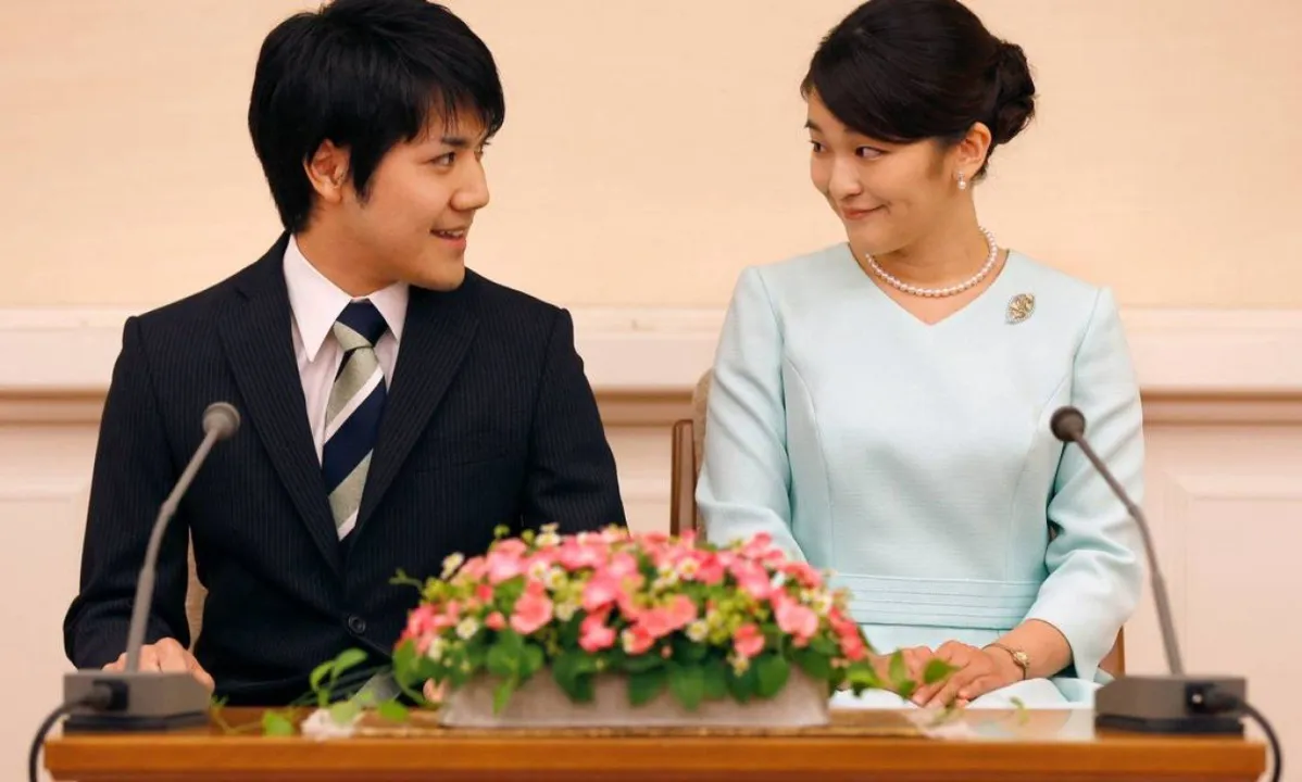 Casal se conheceu na universidade e noivou em 2017. | Foto: Shizuo Kambayashi / AFP