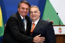 Imagem ilustrativa da imagem Bolsonaro chama premiê húngaro de 'irmão' e usa slogan fascista