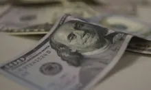Imagem ilustrativa da imagem Dólar cai para R$ 5,10, mesmo com tensões na Ucrânia