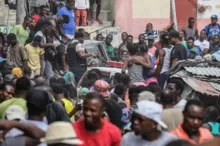 Imagem ilustrativa da imagem Haiti: Crianças morrem durante espera por visto para morar no Brasil