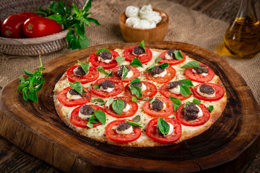 Foi pelas mãos dos italianos que a pizza se popularizou