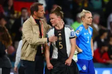 Imagem ilustrativa da imagem Bicampeã, Alemanha é eliminada da Copa ao empatar com Coreia do Sul