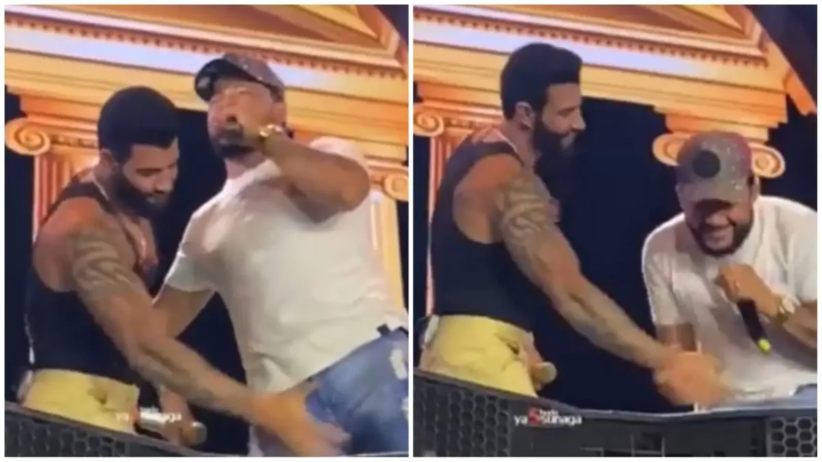 Imagem ilustrativa da imagem Gusttavo Lima apalpa genitália de cantor durante show; vídeo
