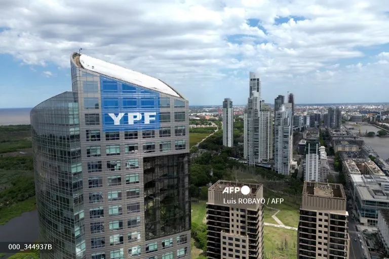 View of the headquarters of the Argentine oil company YPF on November 20, 2023, in Buenos Aires. Libertarian outsider Javier Milei swept to victory in Argentina's presidential election Sunday, vowing to halt decades of economic decline in a country reeling from triple-digit inflation. (Photo by Luis ROBAYO / AFP)