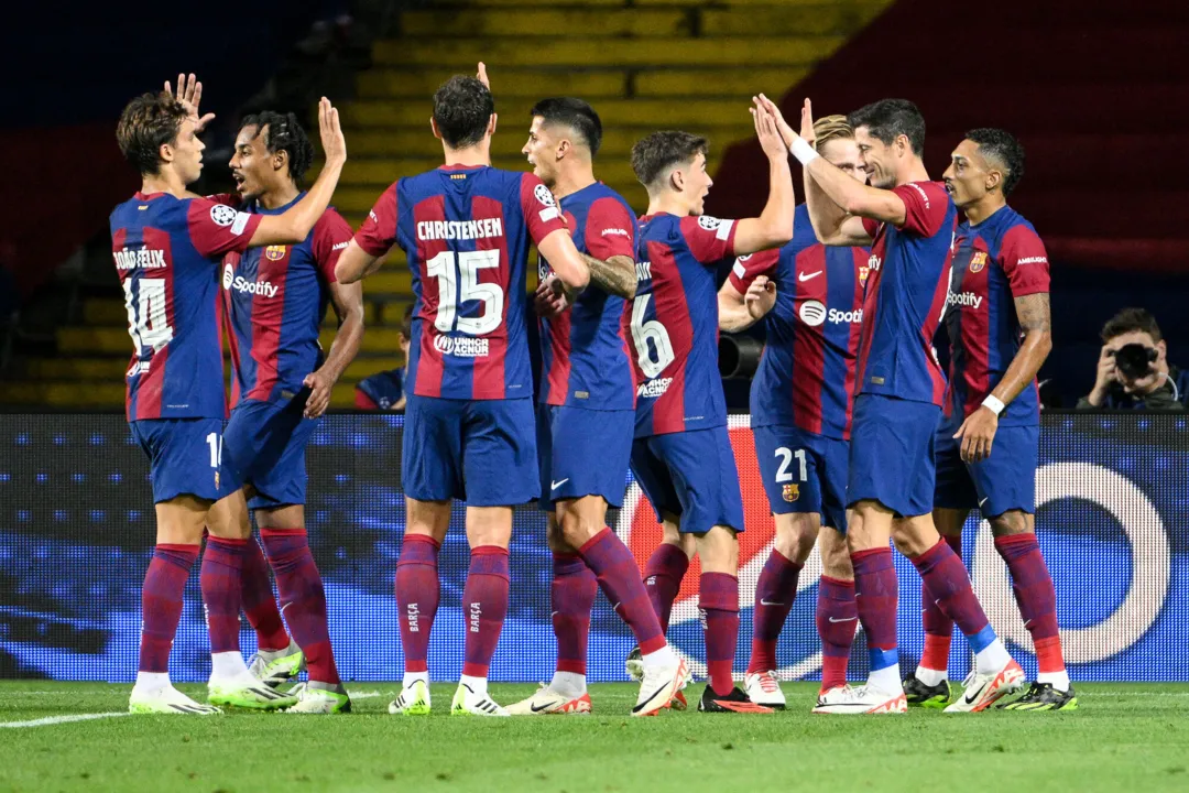 Jogadores do Barcelona comemoram vitória na Champions League