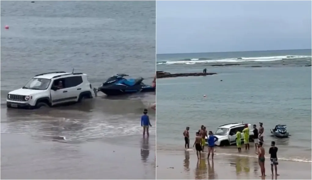 Pessoas tentam ajudar motorista após carro atolar em praia na Bahia