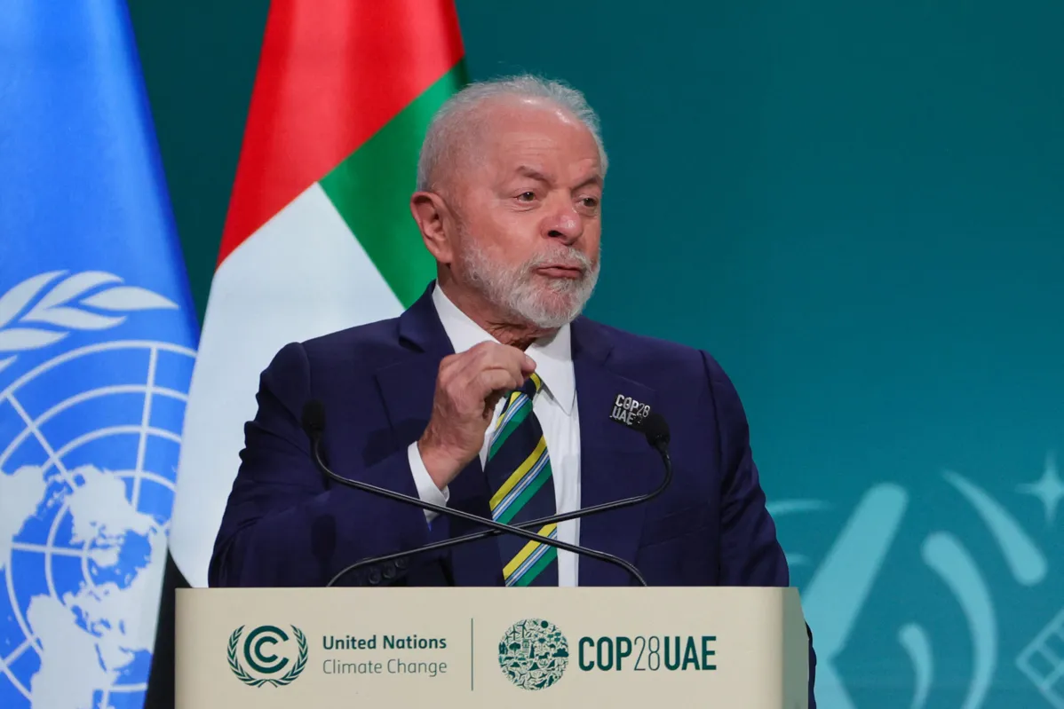 Brazil's President Luiz Inacio Lula da Silva speaks during the High-Level Segment for Heads of State and Government session at the United Nations climate summit in Dubai on December 1, 2023. World leaders take centre stage at UN climate talks in Dubai on December 1, under pressure to step up efforts to limit global warming as the Israel-Hamas conflict casts a shadow over the summit. (Photo by Giuseppe CACACE / AFP)