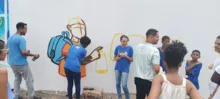 Imagem ilustrativa da imagem Estudantes aprendem a arte do grafite durante Conferência de Cultura