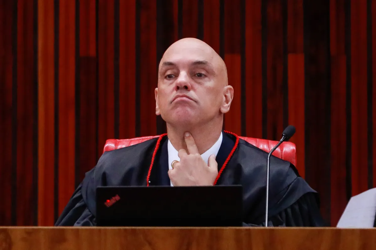Brazil's Superior Electoral Court President Alexandre de Moraes gestures during the fourth day of the trial of Brazilian former President Jair Bolsonaro, accused of abuse of power and misinformation, in Brasilia on June 30, 2023. Brazil's Superior Electoral Tribunal on Friday reached the majority it needs to bar far-right former president Jair Bolsonaro from politics for eight years over his unfounded claims against the voting system. (Photo by Sergio Lima / AFP)