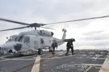 Imagem ilustrativa da imagem Helicópteros da Marinha do Japão caem após possível colisão no ar