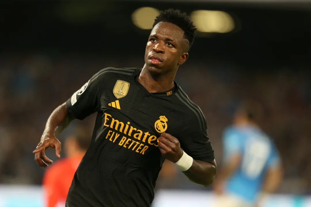 Real Madrid's Brazilian forward #07 Vinicius Junior  celebrates after scoring during the UEFA Champions League 1st round day 2 Group C football match Napoli vs Real Madrid at the Diego Armando Maradona stadium in Naples on October 3, 2023. (Photo by Carlo HERMANN / AFP)