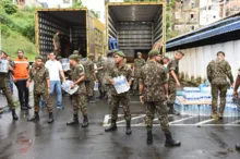 Imagem ilustrativa da imagem Carregamento de donativos arrecadados em Salvador é enviado ao RS