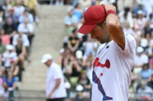 Imagem ilustrativa da imagem Novak Djokovic é atingido por garrafa depois de jogo em Roma