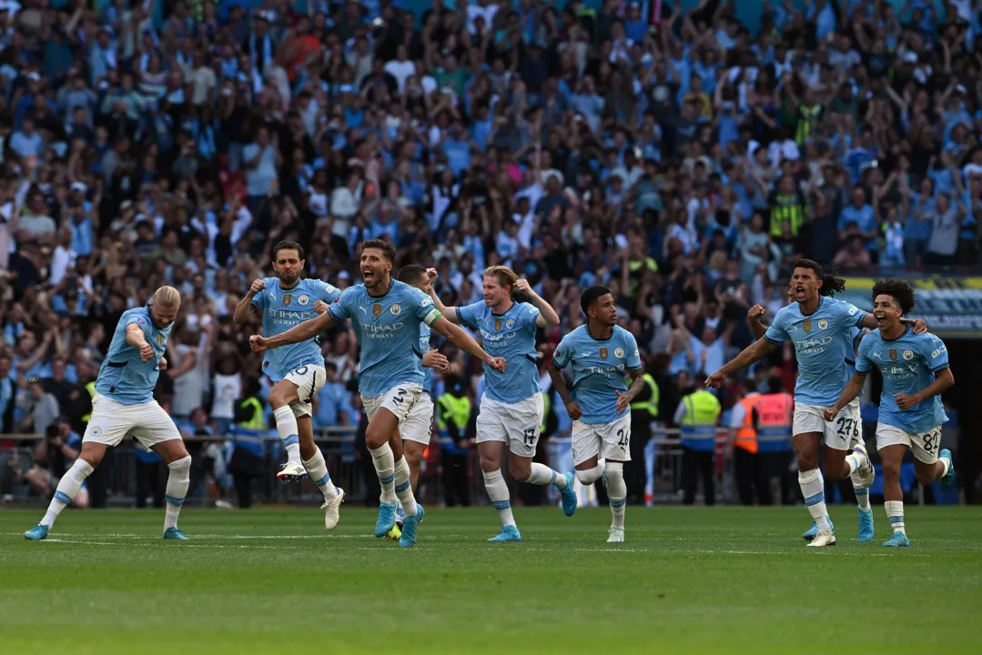 Jogadores do Manchester City comemorando