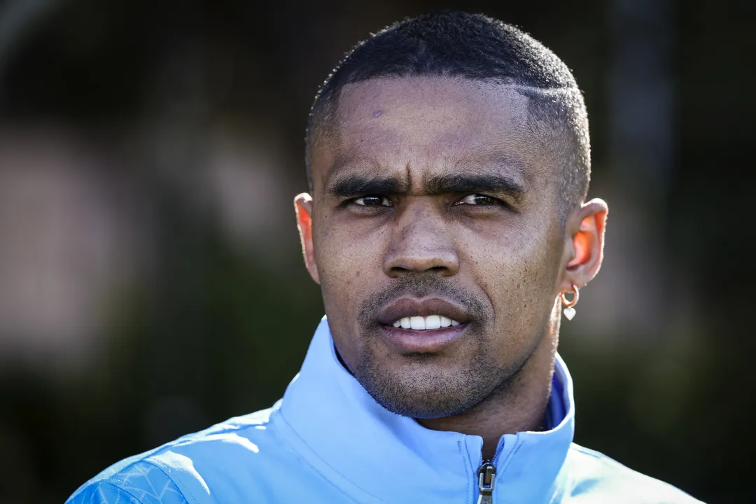 Brazil?s Douglas Costa speaks to the media in Sydney on September 2, 2024. Cristiano Ronaldo's former teammate, Brazil winger Douglas Costa, has signed a two-year deal to play in Australia with Sydney FC, the A-League side said on August 26. (Photo by DAVID GRAY / AFP)