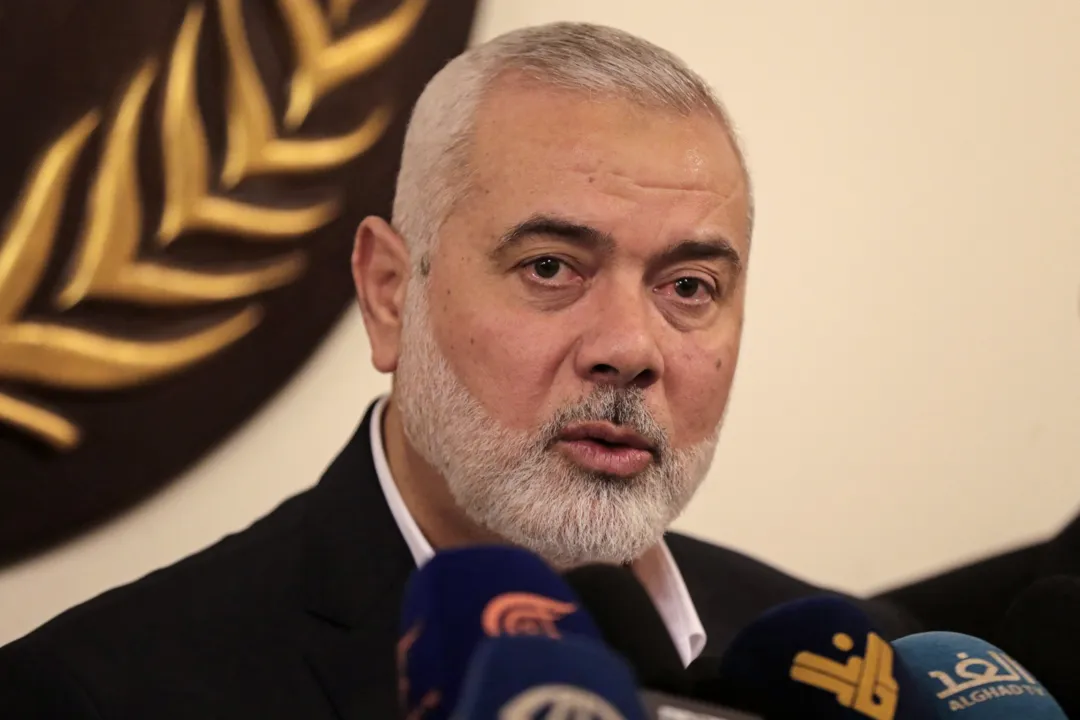 (FILES) Hamas leader Ismail Haniyeh holds a press conference during his visit to the Dar al-Fatwa, Lebanon's top Sunni religious authority, in Beirut on June 22, 2022. Iran's Revolutionary Guards said July 31, 2024 that the chief of the Palestinian Hamas militant group, Ismail Haniyeh, was killed in Tehran along with one of his bodyguards. (Photo by ANWAR AMRO / AFP)