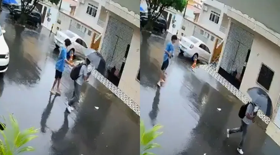 Imagem ilustrativa da imagem Vídeo: pedestre é assaltado por bandido debaixo de chuva em Salvador