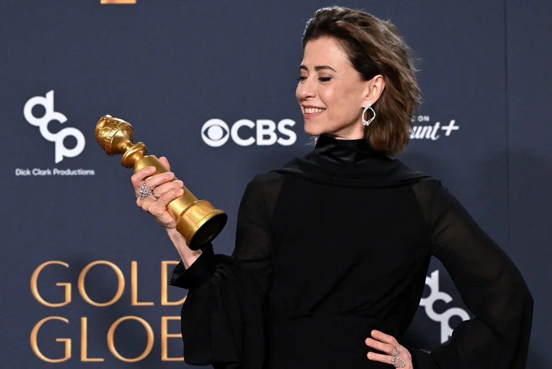 Brazilian actress Fernanda Torres poses with the Best Performance by a Female Actor in a Motion Picture ? Drama award for "I'm Still Here" in the press room during the 82nd annual Golden Globe Awards at the Beverly Hilton hotel in Beverly Hills, California, on January 5, 2025. (Photo by Robyn Beck / AFP)