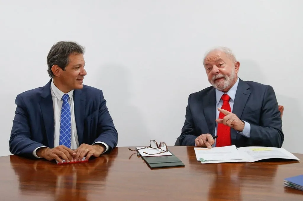 Fernando Haddad (À esquerda) e Lula (à direita)