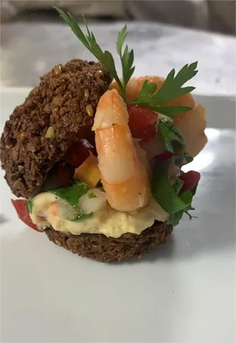 Imagem ilustrativa da imagem Crocante e macio, o falafel pode ser o "pai"  do acarajé?