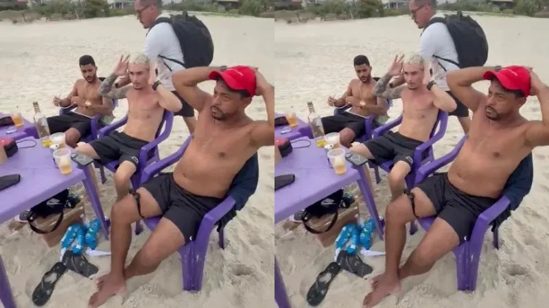 Momento em que a polícia faz a abordagem na praia