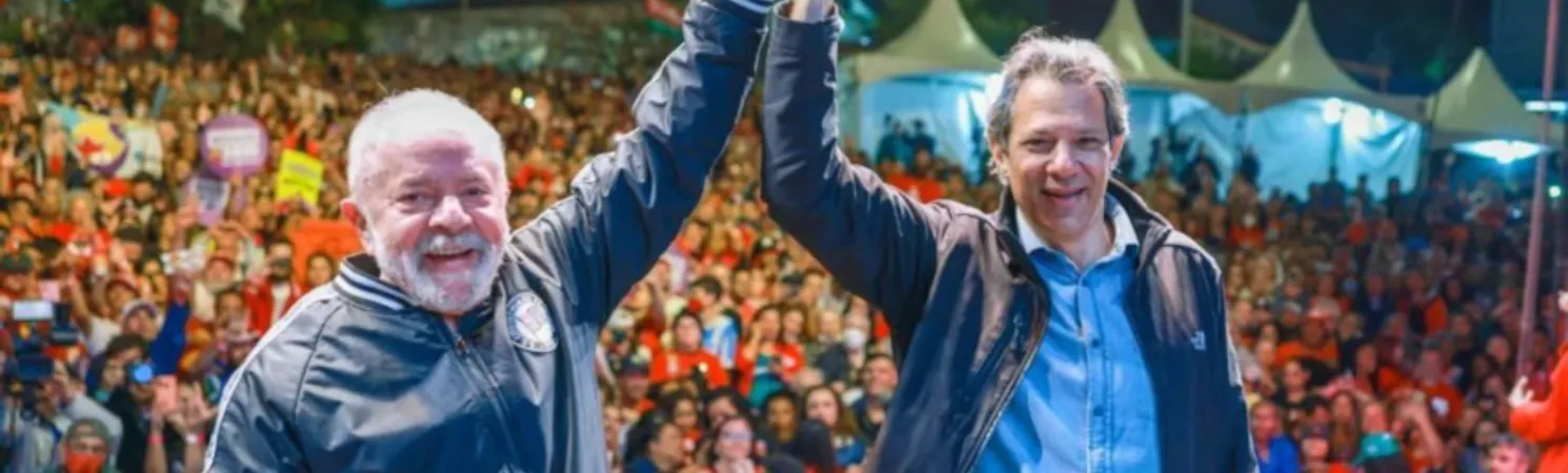 Fernando Haddad ao lado do presidente Lula