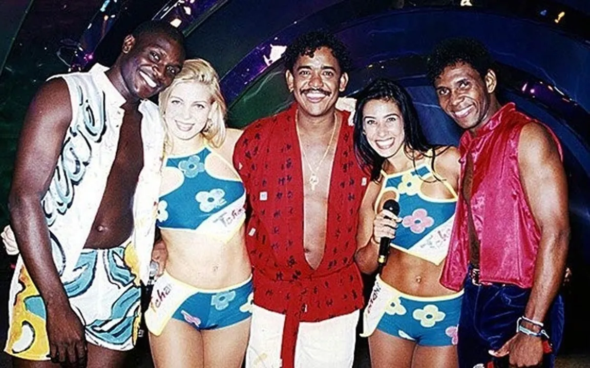 Romance teve início em 1997, época em que Scheila entrou na banda É o Tchan