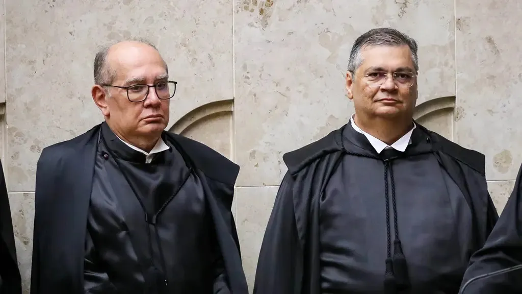 Ministros Gilmar Mendes e Flávio Dino, respectivamente