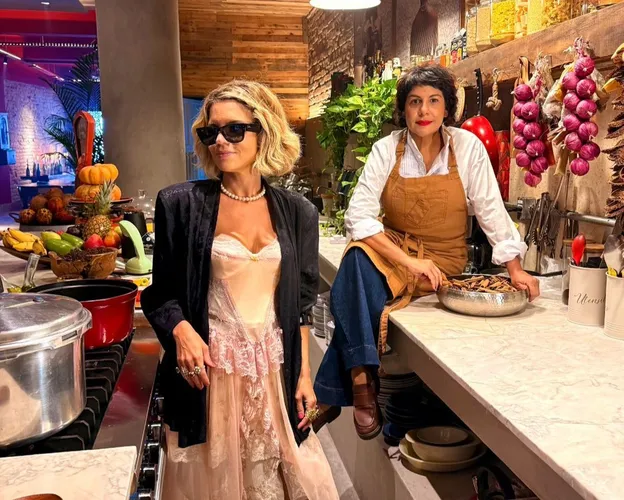 Preta e Paula à frente de encontro que celebra criatividade, afeto e consumo consciente