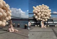 Noiva é arrastada por balões e quase sai voando durante ensaio fotográfico