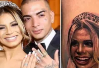 Após divórcio, Guimê cobre tatuagem com rosto de Lexa; veja como ficou