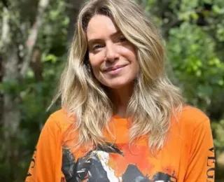 Leticia Spiller nada sem roupa em cachoeira em homenagem a São Jorge