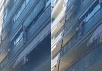 Brasileiro salva criança de 7 anos pendurada em varanda de prédio