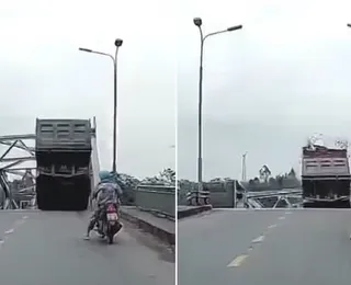 Ponte desaba durante passagem de tufão e veículos são engolidos