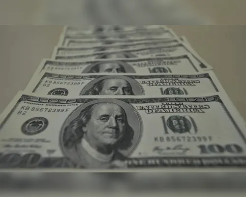 Dólar cai a R$ 5,57, menor valor em oito meses - Imagem