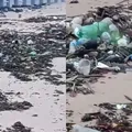 Após chuvas, moradores se reúnem para limpeza da praia de Busca Vida imagem