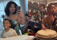 Neto de Arlindo Cruz encanta web com talento para percussão