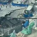 Avenida desaba e cratera gigante "engole" canteiro de obras imagem