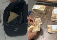PF apreende mala com R$ 400 mil em espécie e prende dois suspeitos