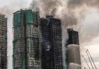 Sobe para 44 o número de mortos em incêndio em Hong Kong imagem