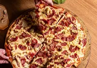 Tradicional rede de pizzarias fecha 90 lojas e declara falência