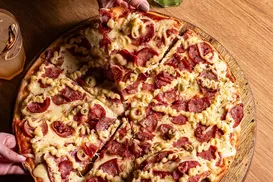 Tradicional rede de pizzarias fecha 90 lojas e declara falência - Imagem