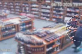 Vídeo: juiz da Lava Jato é flagrado furtando garrafa de champanhe - Imagem