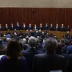 Lula e Alcolumbre ficam lado a lado em posse de ministros no TSE