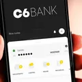INSS suspende empréstimos do C6 Bank por cobranças irregulares imagem