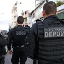 Dupla é presa no Ferry-Boat com dinheiro, munições e distintivos falsos