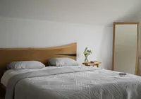 Onde não colocar a cama no quarto: erros que prejudicam o sono imagem